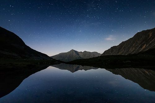 Stars reflection in the water in the Austrian Alps