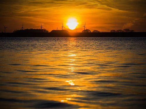 Zonsopgang bij water