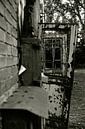 Doors hanging in a frame of a factory building photographed analogously. by Zaankanteropavontuur thumbnail
