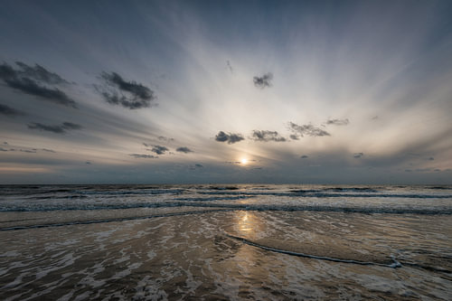Zonsondergang, strand Noordzee