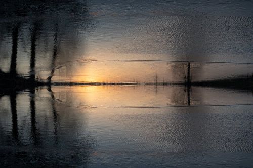 Reflection of sunlight and trees in the water 1