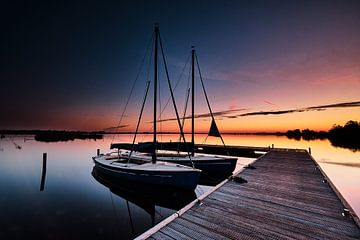 Sailboats at dawn by Jef Folkerts