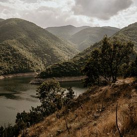 Winding river in the Bulgarian mountain landscape. by Christa Stories