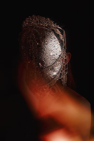 The woman with the rhinestone face by Laura Knipsael