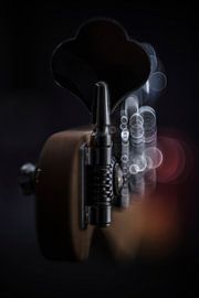 Exciting interplay of light on a bass guitar by Bob Daalder