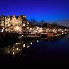 Grachten van Amsterdam in panorama in de nacht van iPics Photography