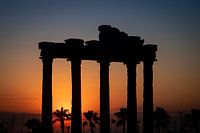 Zonsondergang Tempel van Apollo met palmbomen