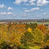 View of Vaals in Autumn colours by John Kreukniet