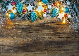 Christmas wood background with snowy fir branch frame by Alex Winter