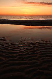 sunset on the beach by Karin Maartense