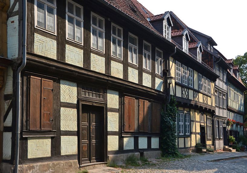 historical medieval buildings in the old town of Quedlinburg by Heiko Kueverling