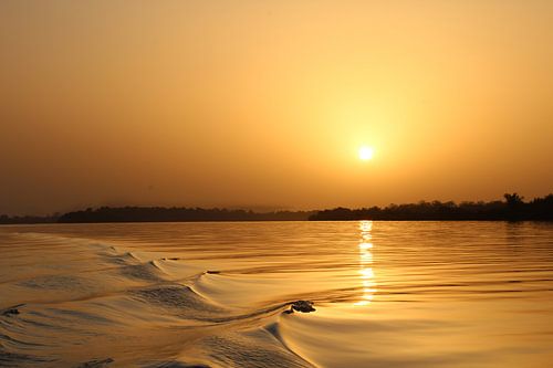 Sunset at the Gambian River van Anouk van Schip - Global Adventures