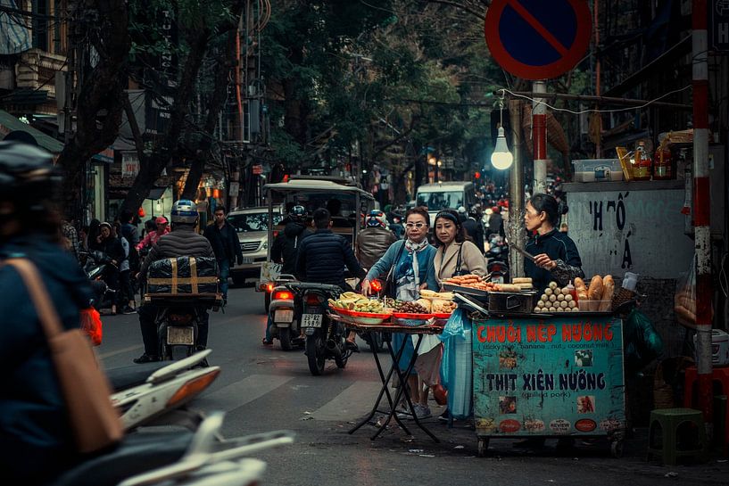 Street life in Hanoi Vietnam. by Ron van der Stappen