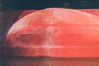 The bow of an ocean-going vessel in port rough