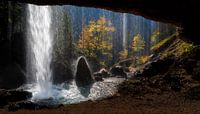 Behind the waterfall