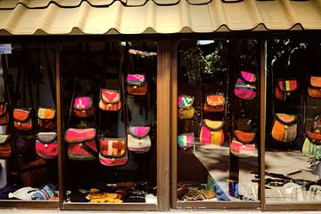 Shop with bags in Santiago, Chile by Sjoerd van der Hucht