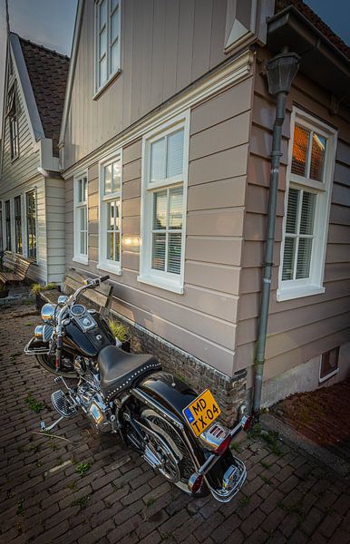 Old motorcycle on the durgdammerdijk by peterheinspictures