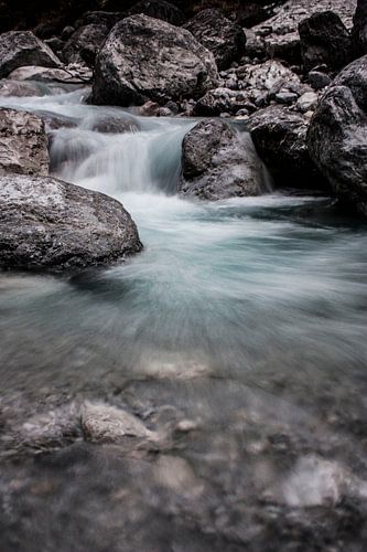 Crystal clear mountain river in scree
