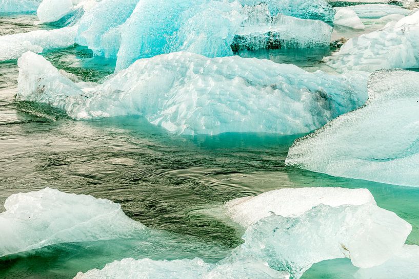 Floes with different ice structure in an ice river in Iceland by Hein Fleuren