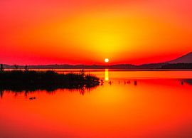 Zonsondergang aan het meer
