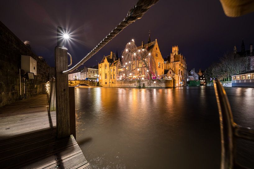 House Perez de Malvenda and Belfry of Bruges during the Christmas period by Marcel Derweduwen