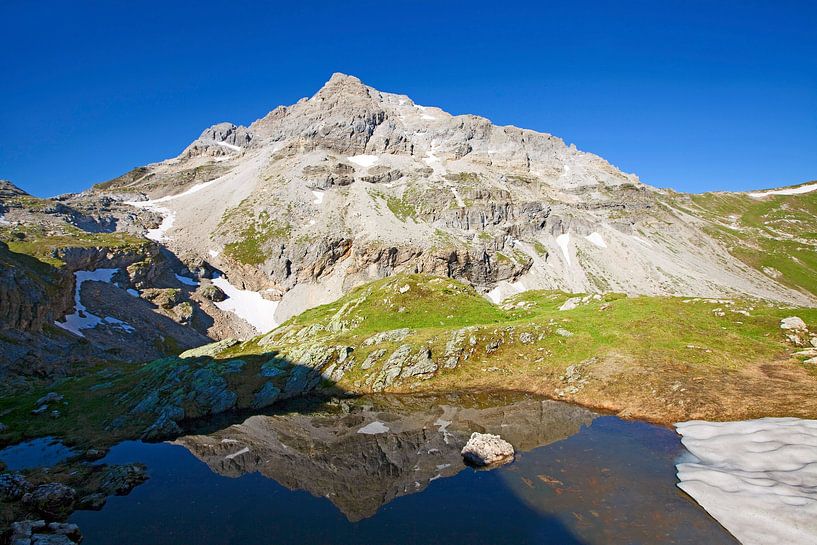 The Faulkogel is reflected in a lake by Christa Kramer