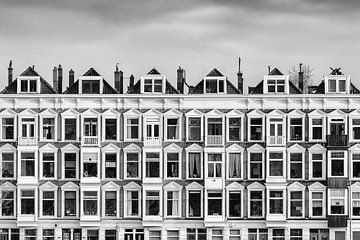 Row of Dutch old white houses by Martin Bergsma