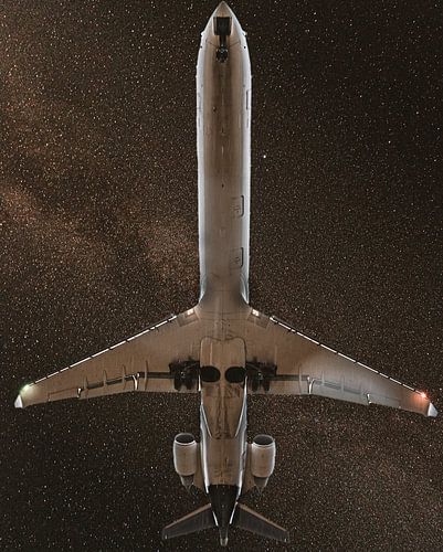 Airplane in front of starry sky