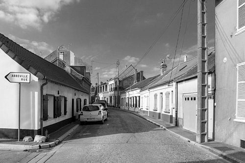 The road to Abbeville; street in the small village of Le Crotoy, France
