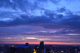 Coloured Clouds over Rotterdam city centre by Marcel van Duinen