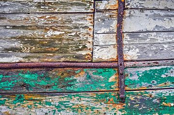 Wooden hull with rust and peeling paint