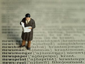Man with newspaper #3