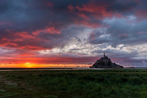 The peninsula of Mont Saint Michel in France at sunset