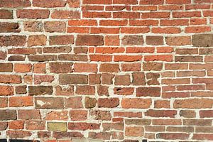 Detail einer alten braun-orangenen Wand
