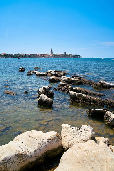 Coast of the Adriatic Sea with the old town of the historical city of Porec in Croatia by Heiko Kueverling