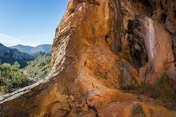 Coves Roges 3, red-brown rocks and caves by Adriana Mueller