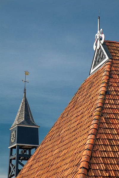 Clock at the harbor of the Frisian town of Hindeloopen by Harrie Muis
