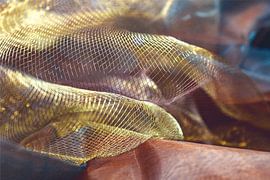 Golden net - play of light on folded fabric by Mixed media vector arts
