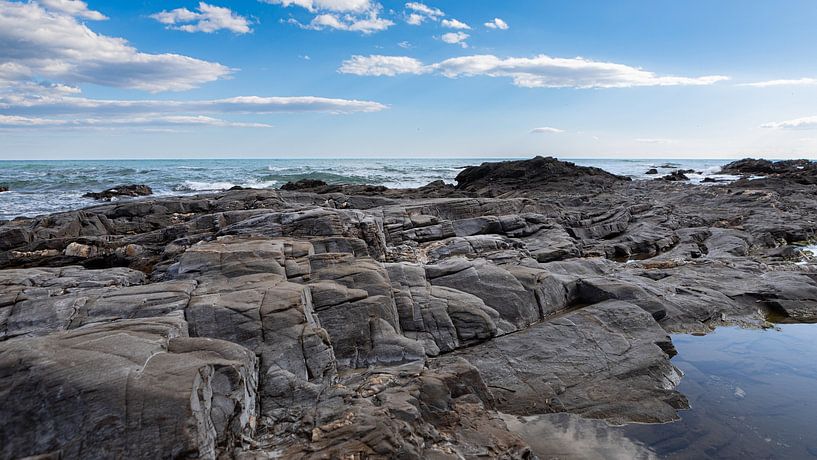 Rocky coast Spain. by Hennnie Keeris