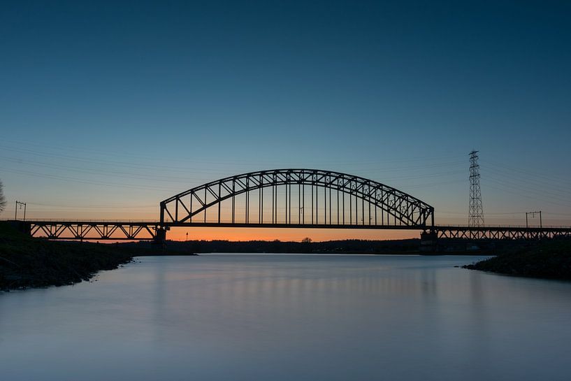 Railway bridge during sunset by Patrick Verhoef
