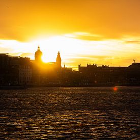 Sunset at Amsterdam Central Station by Brenda bonte