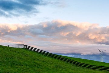 Polder landscape with fence and wind turbines by Haarms