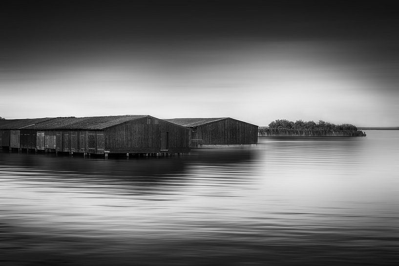 Boathouses at sea by Frank Andree