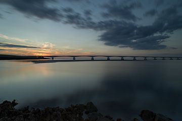 Zeeland bridge with setting sun