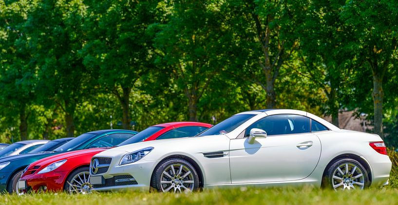 White Mercedes Benz SLK compact luxury roadster by Sjoerd van der Wal Photography