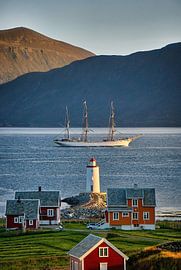 Tall Ship Statsraad Lehmkuhl passes the Høgstein lighthouse before heading out to open sea, Godøy, N by qtx