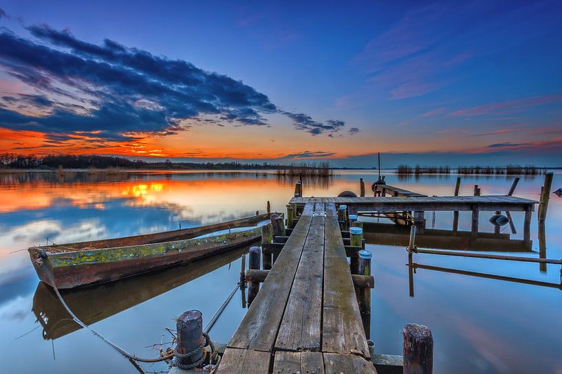 Sunset above a lake, the Netherlands by Richard van der Woude