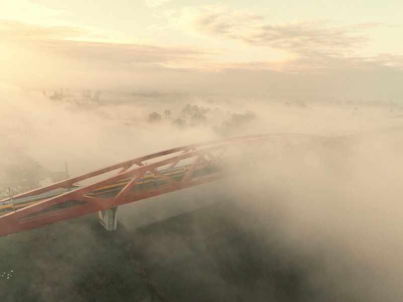 Hanzeboog train bridge over the misty river IJssel by Sjoerd van der Wal Photography