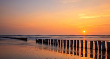 Ondergaande zon op Ameland, Nederland