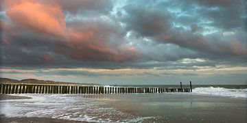 Zonsondergang aan zee